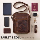 Top-down Ansicht einer kleinen braunen Leder-Umhängetasche salerno mit STILORD-Prägung, Zubehör und 8-Zoll-Tabletmaß