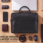 Schwarze Leder-Business-Tasche mit Laptopfach 13-14 Zoll, frontale Ansicht auf Holztisch mit Zubehör, STILORD-Prägung sichtbar