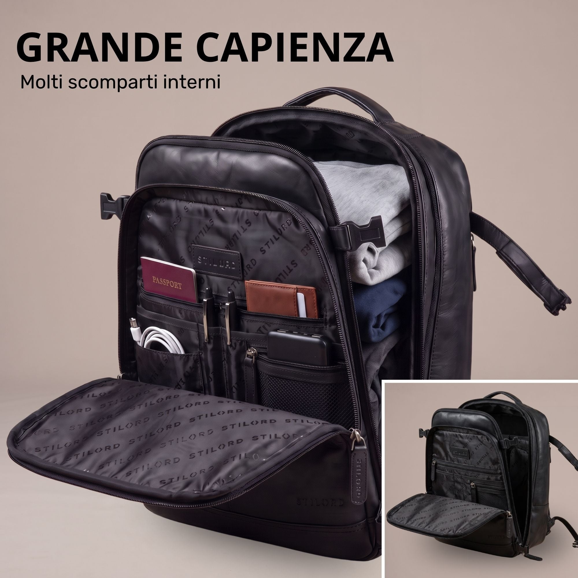 Geöffneter schwarzer Rucksack aus Leder mit Innenfächern, Organizer-Taschen und gepackter Kleidung, Frontalansicht